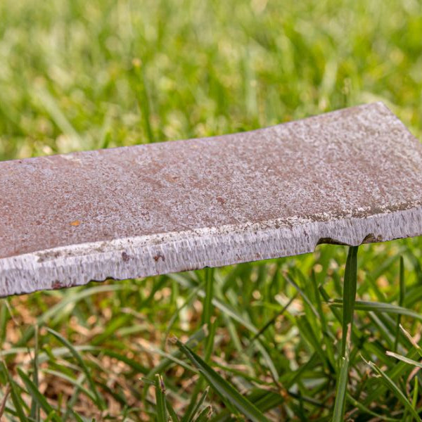 How often should I sharpen my mower blades?